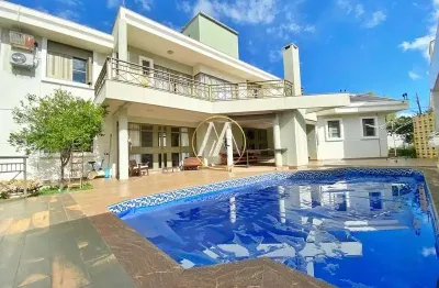 Casa sobrado à venda com 4 suítes, 380m², piscina e área gourmet – jardim asteca, rolândia/pr