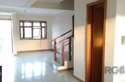 Casa com 2 quartos à venda na Rua Hugo Nelson Magalhães, 139, Parque Santa Fé, Porto Alegre