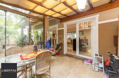 Casa em condomínio fechado com 4 quartos à venda na Rua Attílio Bilibio, 120, Jardim Carvalho, Porto Alegre