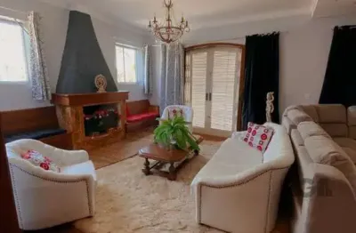 Casa com 4 quartos à venda na Rua Fernando Osório, 275, Teresópolis, Porto Alegre