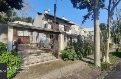 Casa com 4 quartos à venda na Avenida Fábio Araújo Santos, 1212, Nonoai, Porto Alegre