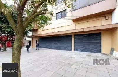 Libertas imobiliária aluga loja na av. assis brasil com 530m²-passo d`areia