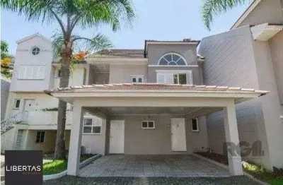 Casa em condomínio fechado com 4 quartos para alugar na Avenida Coronel Marcos, 483, Pedra Redonda, Porto Alegre