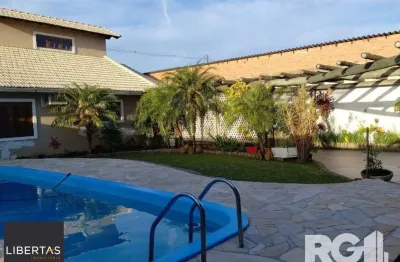 Casa com 3 quartos à venda na Rua Brinco-de-Princesa, 269, Restinga, Porto Alegre
