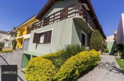 Casa em condomínio fechado com 3 quartos à venda na Avenida Nilo Ruschel, 612, Morro Santana, Porto Alegre