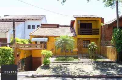 Casa com 4 quartos à venda na Rua Altos da Amapá, 90, Vila Nova, Porto Alegre