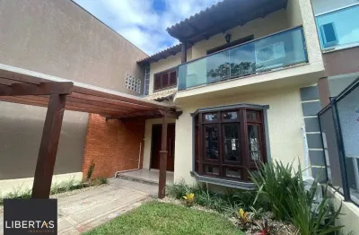 Casa com 3 quartos à venda na Rua Roberto Santini, 194, Hípica, Porto Alegre