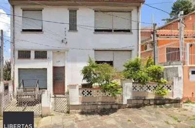 Casa com 3 quartos à venda na Rua Umbú, 389, Passo da Areia, Porto Alegre