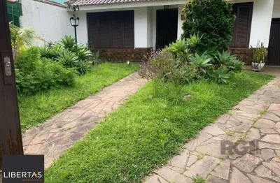 Casa com 3 quartos à venda na Rua Mura, 60, Guarujá, Porto Alegre