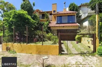Casa com 4 quartos à venda na Rua Doutor Raul Franco Di Primio, 90, Teresópolis, Porto Alegre