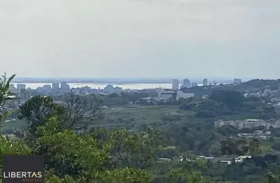 Terreno à venda na Estrada Jorge Pereira Nunes, 1689, Campo Novo, Porto Alegre