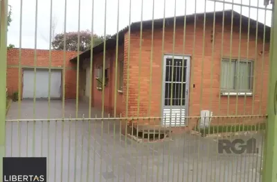 Casa com 3 quartos à venda na Avenida Bernardino Silveira de Amorim, 345, Sarandi, Porto Alegre