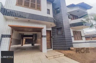Casa com 240m², 3 dormitórios, 6 vagas no bairro sarandi