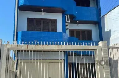 Casa 420m², 4 dormitórios, 3 vagas no bairro partenon