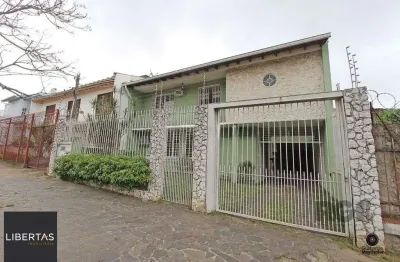 Casa com 5 quartos à venda na Rua Guilherme Alves, 1547, Partenon, Porto Alegre