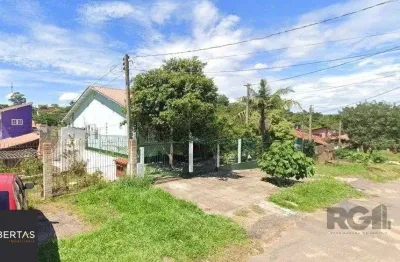 Casa com 3 quartos à venda na Rua Ênio de Souza, 226, Vila Nova, Porto Alegre