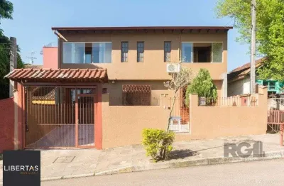 Casa com 4 quartos à venda na Rua Adroaldo Novo Correa, 126, Cavalhada, Porto Alegre
