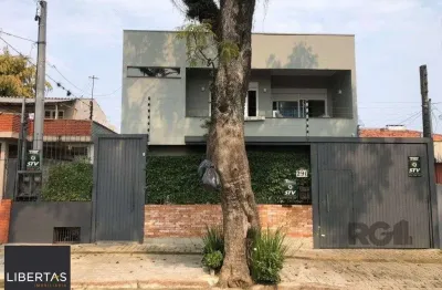 Casa com 4 quartos à venda na Rua Menezes Paredes, 290, Nonoai, Porto Alegre