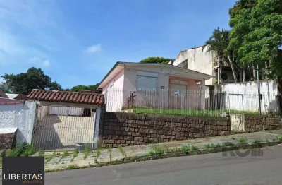 Terreno com casa com 3 quartos, vaga de garagem, no bairro ipanema, porto alegre/rs