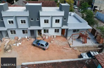 Casa em condomínio fechado com 2 quartos à venda na Rua Miguel Ascoleze, 125, Vila Nova, Porto Alegre