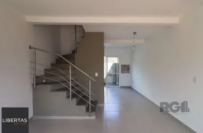 Casa em condomínio fechado com 2 quartos à venda na Rua Miguel Ascoleze, 125, Vila Nova, Porto Alegre
