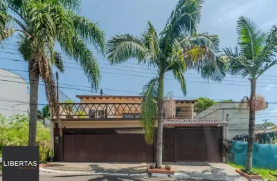 Excelente casa a venda no bairro ipanema, 3 dormitórios com suíte e 8 vagas de garagem!