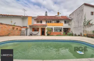 Casa a venda composta de 4 dormitórios no bairro jardim isabel em porto alegre