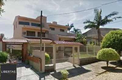 Casa com 3 quartos à venda na Rua Professor Henrique Desjardins, 308, Espírito Santo, Porto Alegre