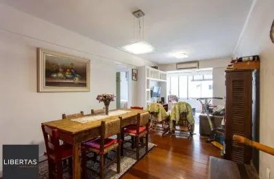 Apartamento com  73m², 2 dormitórios,  área de serviço separada, living 2 ambientes , vaga de garagem escriturada e coberta.