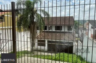 Casa com 3 quartos à venda na Rua Lloyd de Andrade Polidoro, 106, Ipanema, Porto Alegre