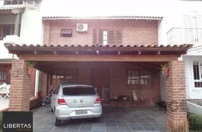 Casa em condomínio fechado com 3 quartos à venda na Avenida Juca Batista, 1458, Cavalhada, Porto Alegre