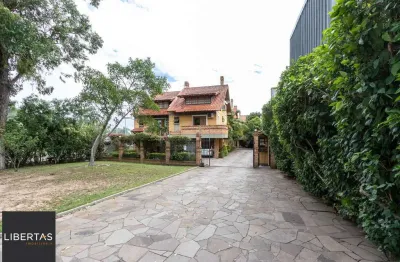 Casa em condomínio fechado com 3 quartos à venda na Avenida Coronel Marcos, 2171, Pedra Redonda, Porto Alegre