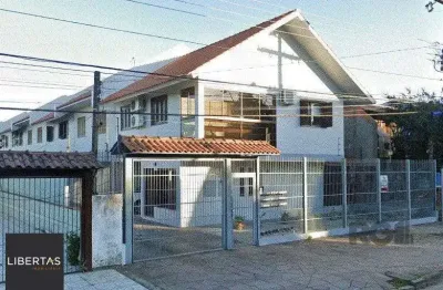 Casa em condomínio fechado com 3 quartos à venda na Rua Marquês do Maricá, 455, Vila Nova, Porto Alegre
