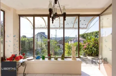 Casa com 2 quartos à venda na Rua Oscar Tollens, 242, Santa Tereza, Porto Alegre