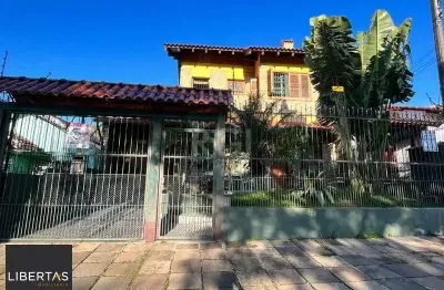 Casa com 3 quartos à venda na Rua Frederico Etzberger, 278, Nonoai, Porto Alegre