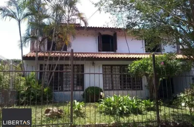 Casa com 4 quartos à venda na Rua Manoel Leão, 45, Pedra Redonda, Porto Alegre