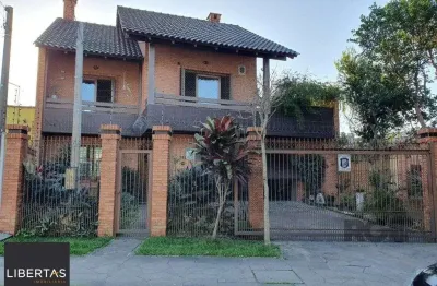 Casa com 3 quartos à venda na Rua Conselheiro Davila, 632, Jardim Floresta, Porto Alegre