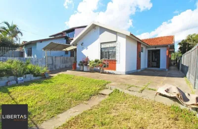 Casa com 5 quartos à venda na Rua João Mora, 258, Camaquã, Porto Alegre