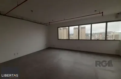 Excelente sala comercial no menino deus, com uma vaga de garagem.