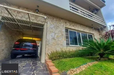 Excelente casa com 3 dormitórios e 3 vagas de garagem