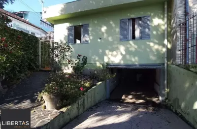 Casa com 3 quartos à venda na Rua Álvaro Nicofé, 97, Vila Jardim, Porto Alegre