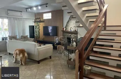 Casa com 4 quartos à venda na Rua Porto Calvo, 212, Ipanema, Porto Alegre