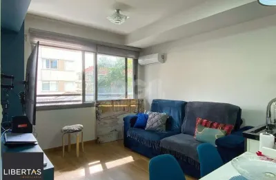 Apartamento em prédio premiado, totalmente montado, no miolo do menino deus