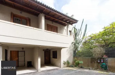 Casa em condomínio fechado com 2 quartos à venda na Avenida Guarujá, 126, Guarujá, Porto Alegre