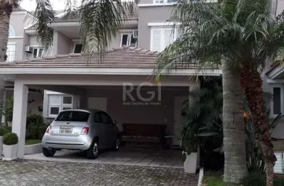 Casa em condomínio fechado, às margens do rio guaíba,