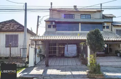 Casa com 3 quartos à venda na Rua Doutor Egydio Michaelsen, 58, Cavalhada, Porto Alegre