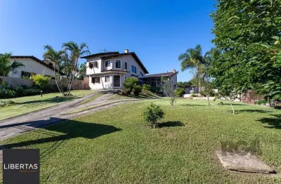 Casa com 3 quartos à venda na Rua Flor de Pessegueiro, 105, Vila Nova, Porto Alegre