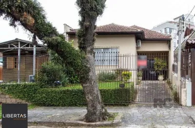 Casa térrea, 2 quartos, 2 vagas, edicula com 1 quarto e um banheiro - bairro tristeza