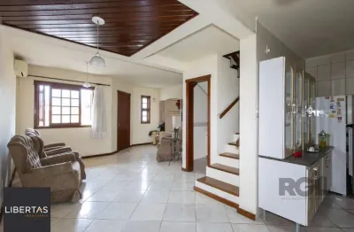 Casa em condomínio na zona sul, no bairro hípica, com 2 dormitórios, living para dois ambientes, cozinha mobiliada, lavabo