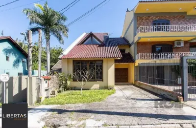 Casa em condomínio fechado com 3 quartos à venda na Avenida Vicente Monteggia, 1010, Cavalhada, Porto Alegre